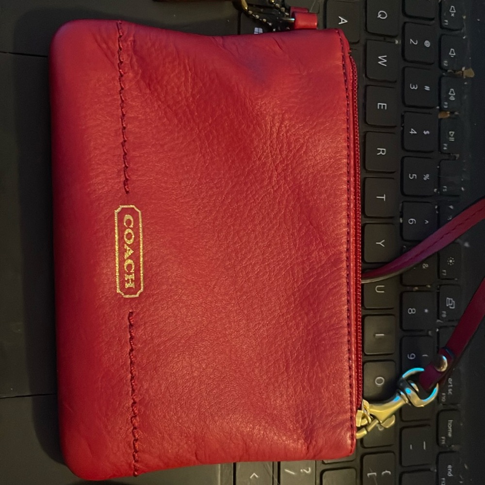 Beautiful authentic red wristlet coach